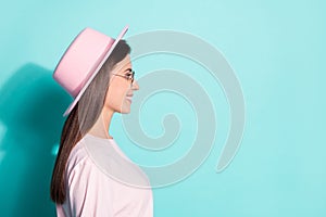 Close-up profile side view portrait of her she nice attractive cheery brown-haired girl wear pink hat copy empty blank