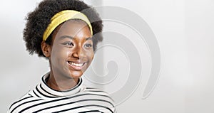Close-up profile side view portrait of smiling young woman african american nice attractive lovely pretty lovable cheerful cheery