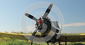 Close-up of the propeller of an old restored plane.