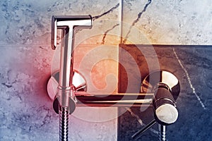 Close-up. pseudo-bide hanging on the wall. multi-colored tile