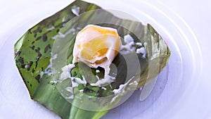 Close up of Pumpkin Koci or Kuih Koci Labu, the Malay glutinous rice flour made of pumpkin