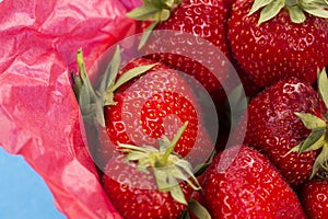 Close up of a punnet of strawberries