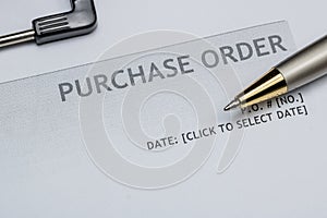 Close up of purchase order form with pen