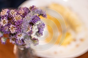 Close up of purple flower in vase