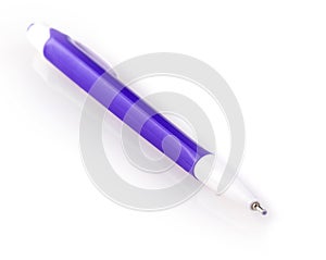 Close up of purple pen on white background.