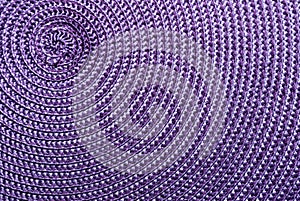 Close-up of purple synthetic fabric.