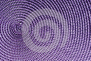 Close-up of purple synthetic fabric.