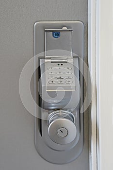 Close-up push-button lock of entrance doors. The security code combination to unlock the door