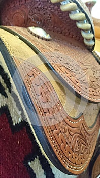 Close up of quarterhorse leather saddle