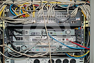 Close-up Of Rack Mounted Routers In A Server Room photo