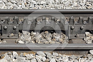 Close-up of a railroad track with a rack