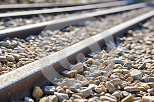 close-up of a railway track detail with grit stones