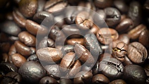 Close up of raining coffee beans in slow motion both arabica and rubusta