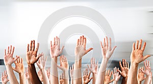 Close-up Of Raised Hands