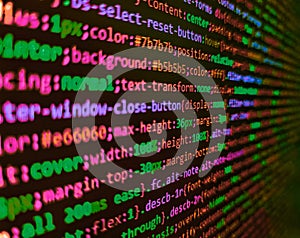 Close up of random computer code comprised of numbers and letters. Developing programming and coding technologies. Screen of web