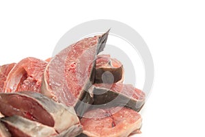 Raw catfish in plate on white background