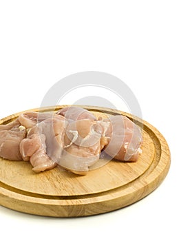 Close-up of raw Chicken fillet on hardboard