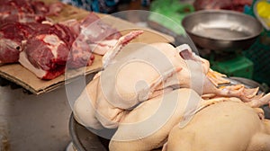 Close up on raw chicken with meat for sale photo