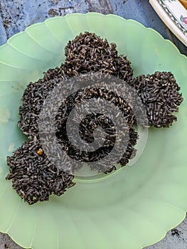 Close up of raw crackers on a green plate