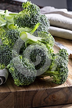 Close-up of raw, fresh broccoli BrÃÂ©col, brÃÂ³colli, brÃÂ³qui, broccoli brote, brassica oleracea stalks with drops of water in the photo