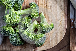 Close-up of raw, fresh broccoli BrÃÂ©col, brÃÂ³colli, brÃÂ³qui, broccoli brote, brassica oleracea stalks with drops of water in the photo