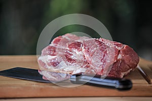 Close up raw pork on cutting board