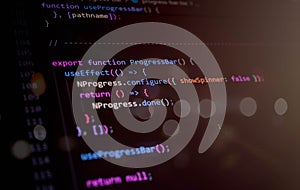Close-up of React code using useEffect hook and NProgress configuration to build a progress bar component, representing frontend