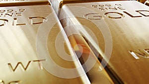 Close-up real ingots of the gold bars in the safe bank deposit box loopable