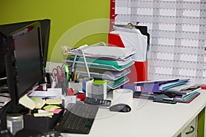 Close-up of real life messy desk in office