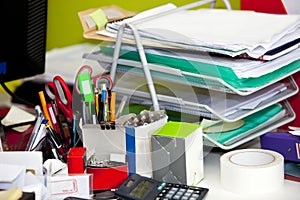 Close-up of real life messy desk in office