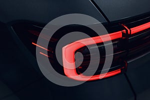 Close-up of the rear light of a modern car. Led optics of the car. Detail on the rear light of a car.