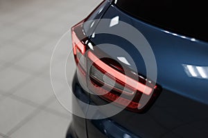 Close-up of the rear light of a modern car. Led optics of the car. Detail on the rear light of a car. Car detail.