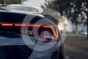 Close-up of the rear light of a modern car. Led optics of the car. Detail on the rear light of a car