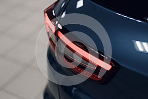 Close-up of the rear light of a modern car. Led optics of the car. Detail on the rear light of a car. Car detail