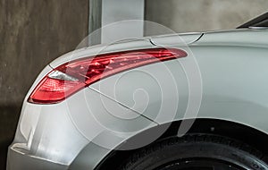 Close-up of Rear light or Tail lamp of White peugeot rcz sports car