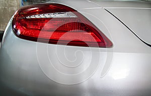 Close-up of Rear light or Tail lamp of White peugeot rcz sports car