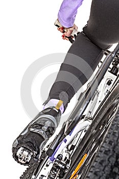 Close up rear view cyclist pedaling bike