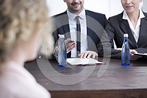Close-up of recruiters in suits