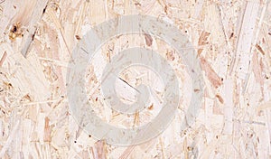 Close up of recycled compressed wood chippings board abstract texture background