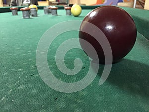 Close up of a red ball at a billards game photo