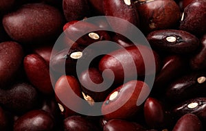 A close up of red beans with a grainy texture