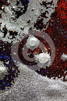 Close-up of a red and black Pottery Glacing