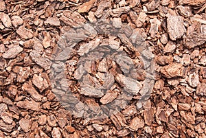 Close-up of red brown mulch made of pine bark.