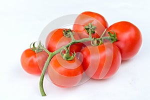 Close up red cherry tomato on white background isolated