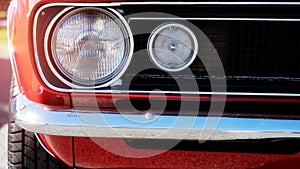 Close Up Of Red Classic Car Headlight