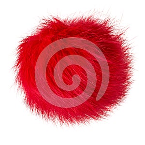 Close up of red colors rabbit fur pompom isolated on white background