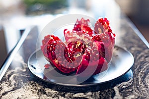 Close-up of a red cut pomegranate