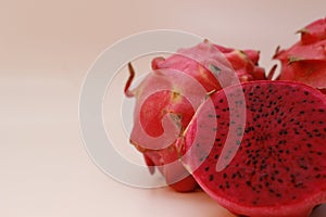 a close up of red dragon fruit isolated on white background.