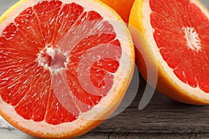 Close up of red grapefruit cut in half