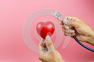 Close up a red heart shape and medical stethoscope